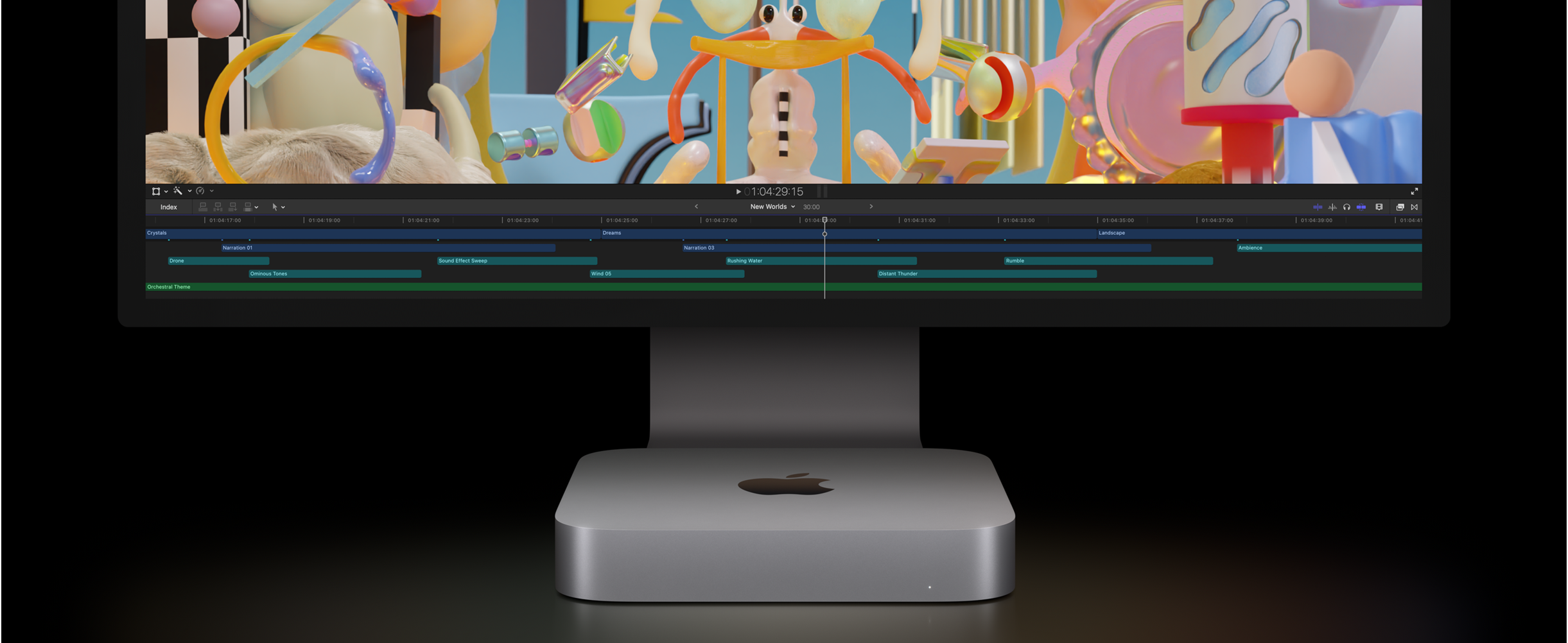 Vista frontal de una Mac mini y un monitor Studio Display en el que se muestra un proyecto de edición de video en Final Cut Pro.